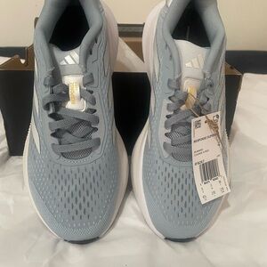 Adidas' Light Blue and White Sneakers